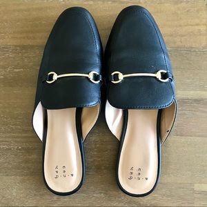 Black classic slip on loafers with gold accent